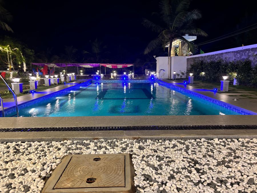 Resort swimming pool at night, Mugaiyur ECR